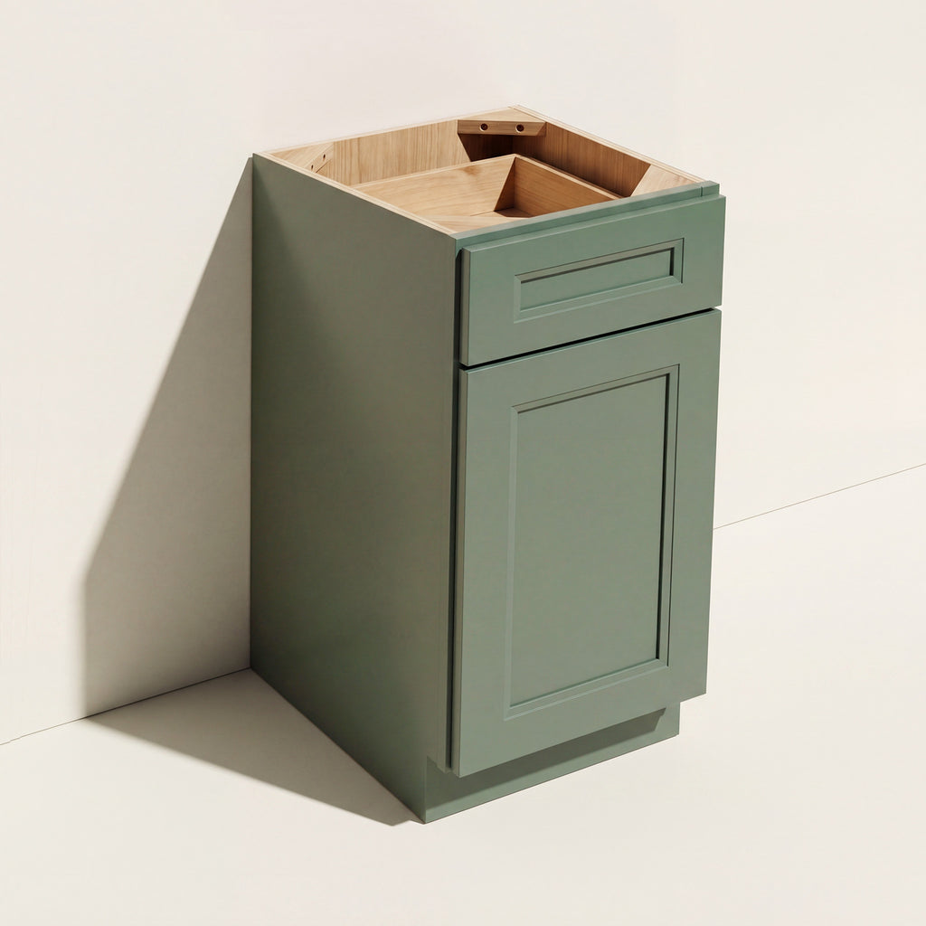 Angled view of a green Belmont shaker 15 inch base cabinet with 1 door and 1 functional drawer.