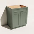 Angled view of a green 24w Belmont Shaker double door base cabinet with 2 doors and 1 functional drawer.