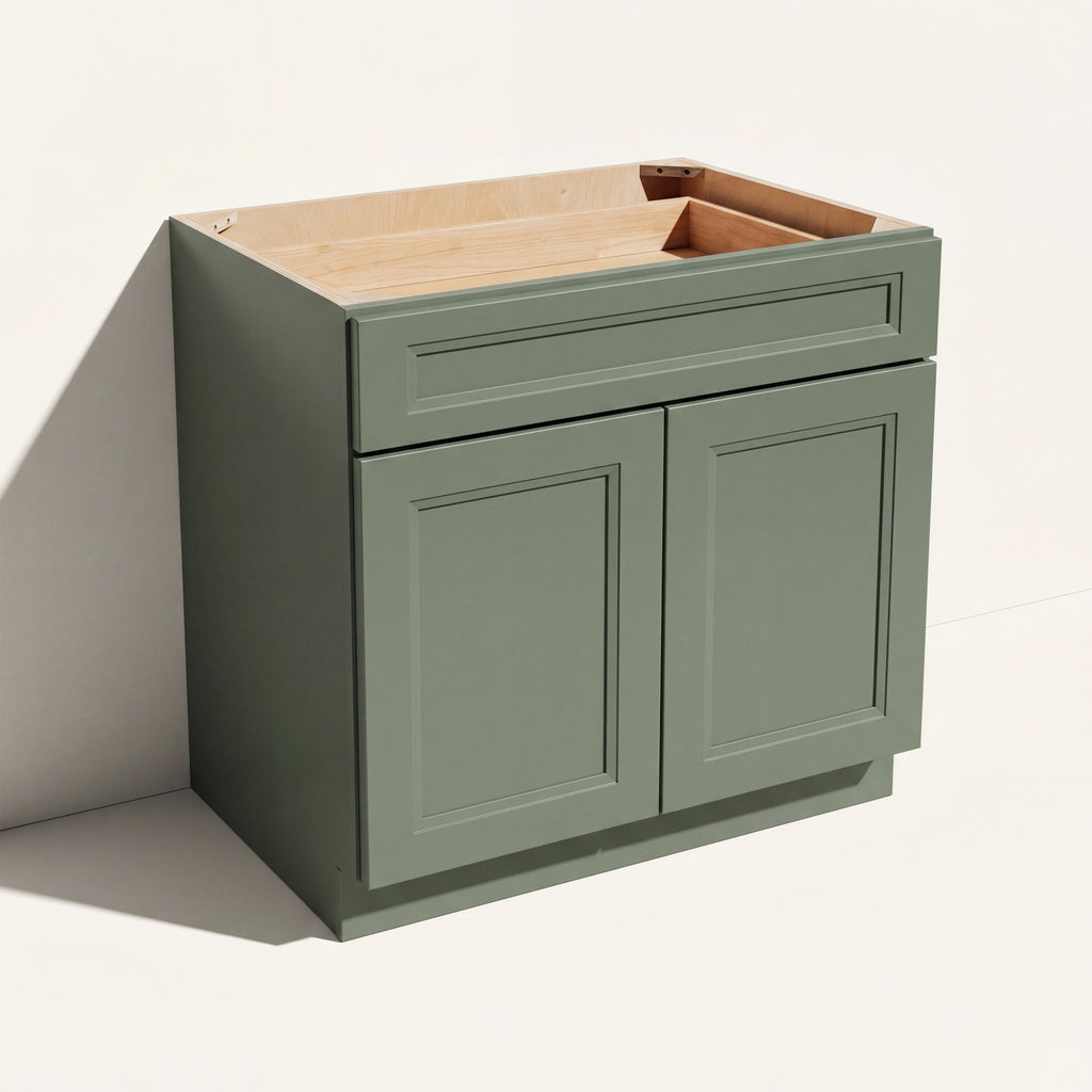 Angled view of a green 33w Belmont beveled Shaker standard base cabinet with 2 doors and 1 functional drawer.
