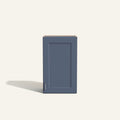 Straight on view of a Belmont Blue Wall Cabinet with a solid door.