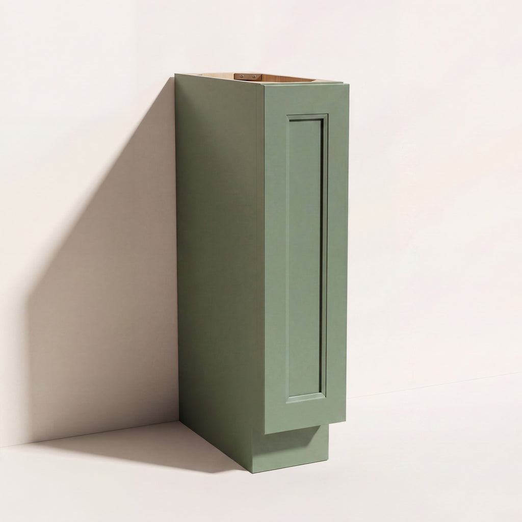 Angled view of a green Belmont beveled Shaker full height base cabinet with 1 door.