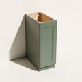 Angled view of a green Belmont beveled Shaker full height base cabinet with 1 door and no drawers.