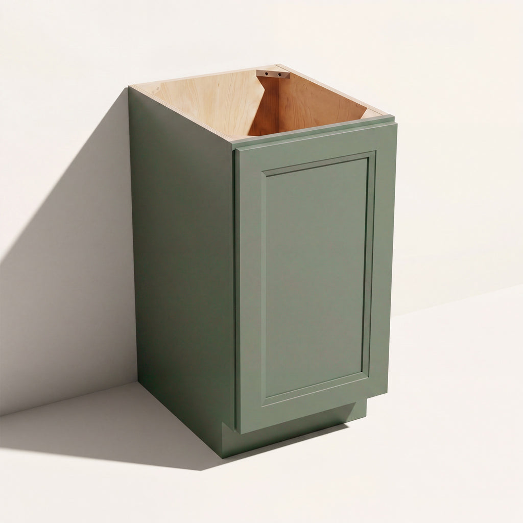 Angled view of a green Belmont beveled Shaker full-height base cabinet with 1 door and assembled construction.
