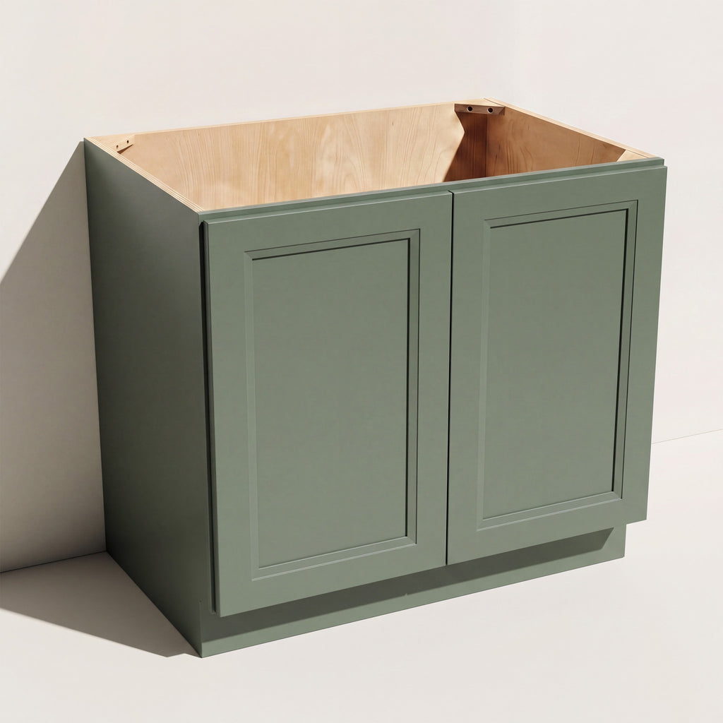 Angled view of a green 36w Belmont beveled Shaker full height base cabinet with 2 doors.
