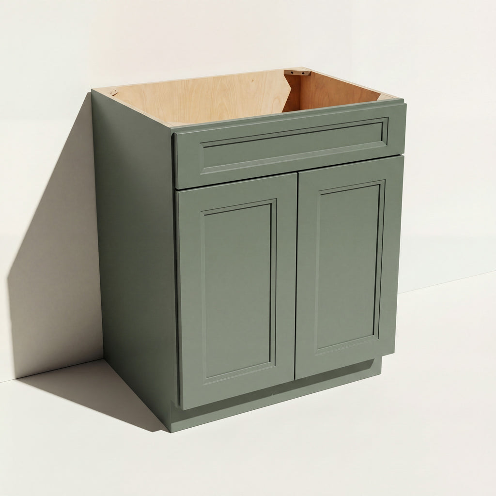 Angled view of a green 24w Belmont Shaker sink base cabinet with 2 doors and 1 false drawer.
