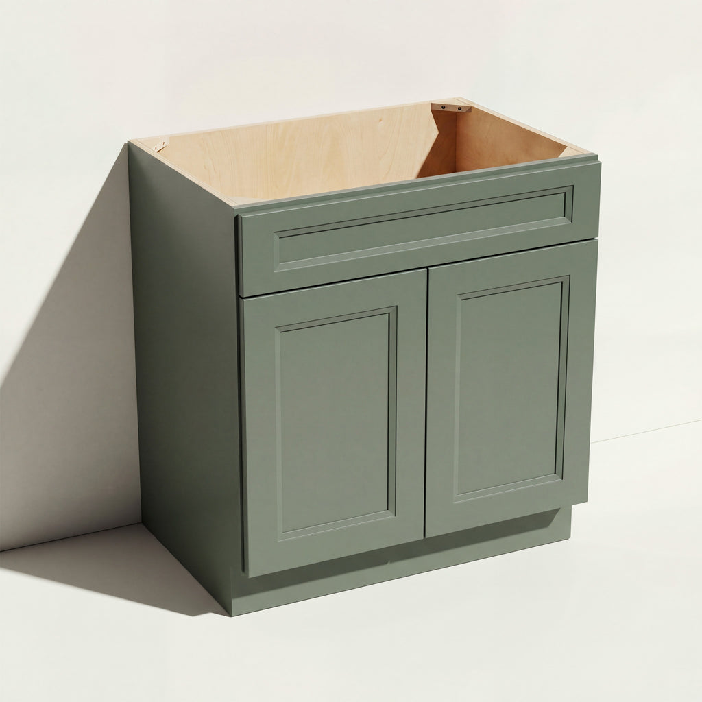 Angled view of a green 27w Belmont beveled Shaker sink base cabinet with 2 doors and 1 false drawer.