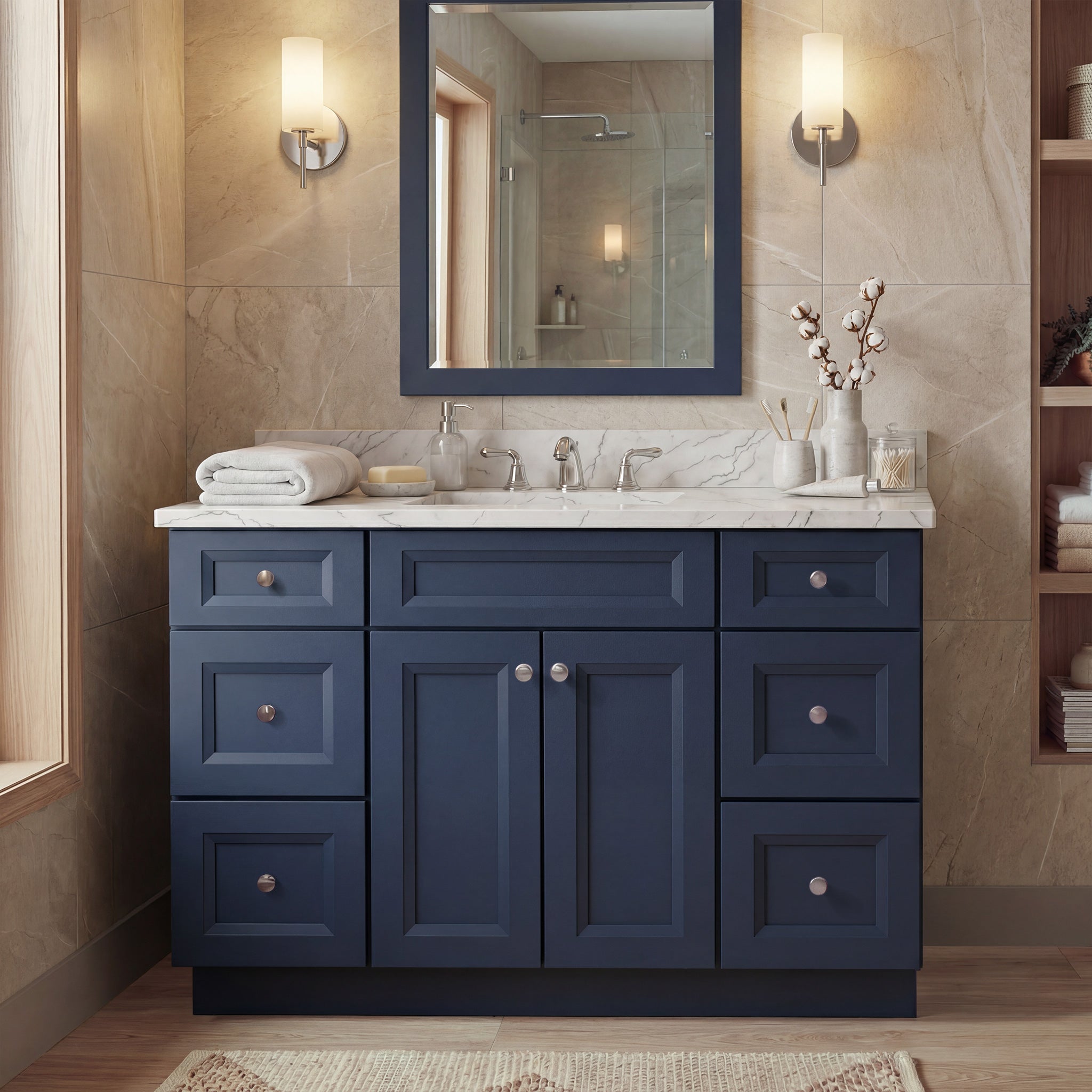 Front view of a blue Belmont shaker vanity with 2 doors, 6 drawers, and 1 false drawer front in a warm contemporary bathroom.