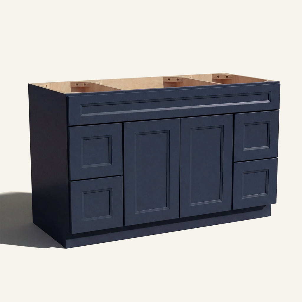 Angled view of a blue Belmont beveled Shaker wide single sink vanity base with 2 doors, 4 drawers, and 1 false drawer front.