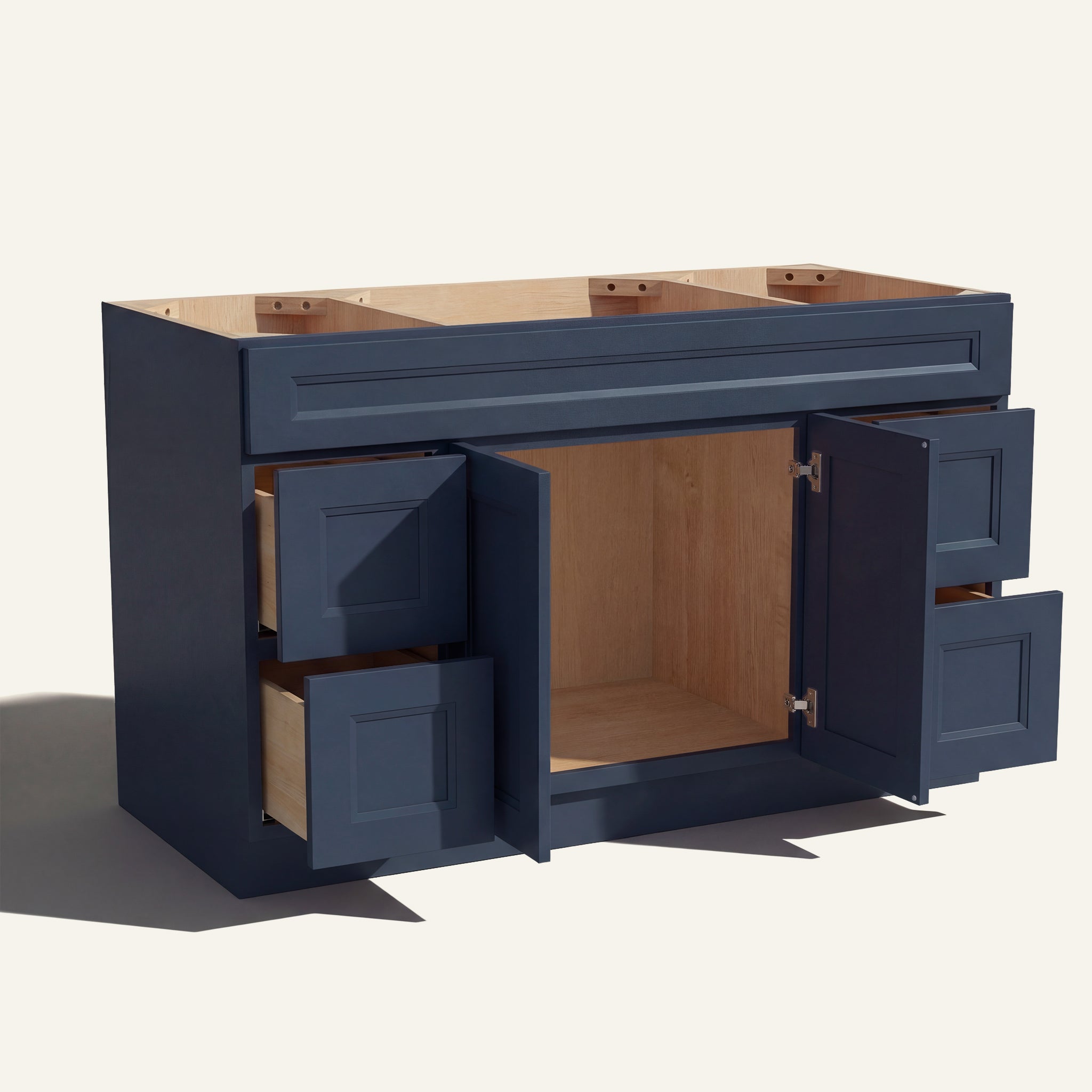 Open view of a blue Belmont beveled Shaker single sink vanity base with 2 doors and 4 drawers showing the stained interior.
