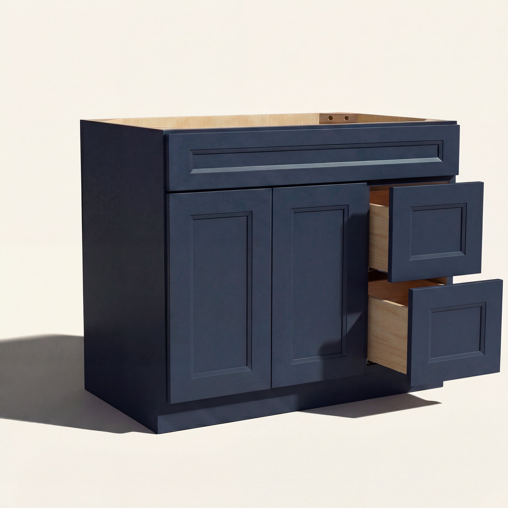 Open view of blue Belmont beveled Shaker single sink vanity, 2 doors, 2 drawers right, and 1 false drawer front.