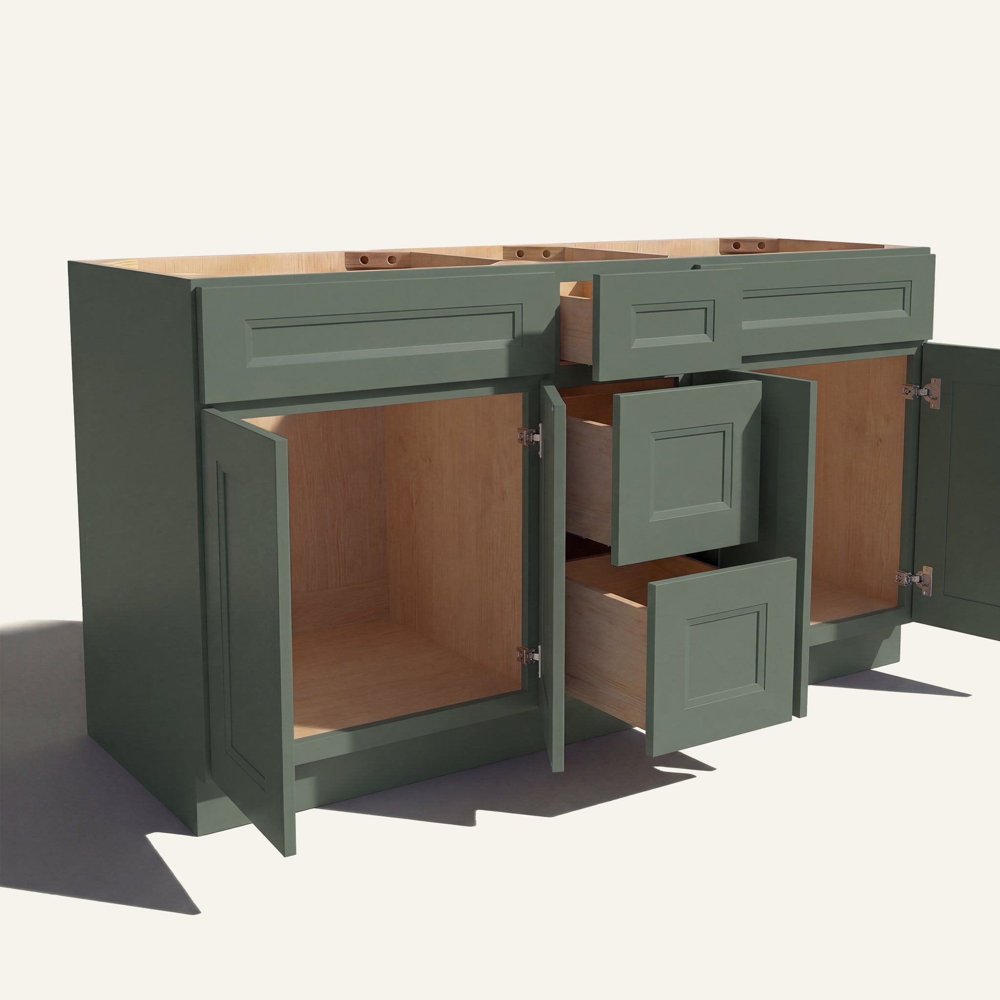 Angled view of a green Belmont beveled Shaker double sink vanity base with doors and 3 drawers open showing wood interior.