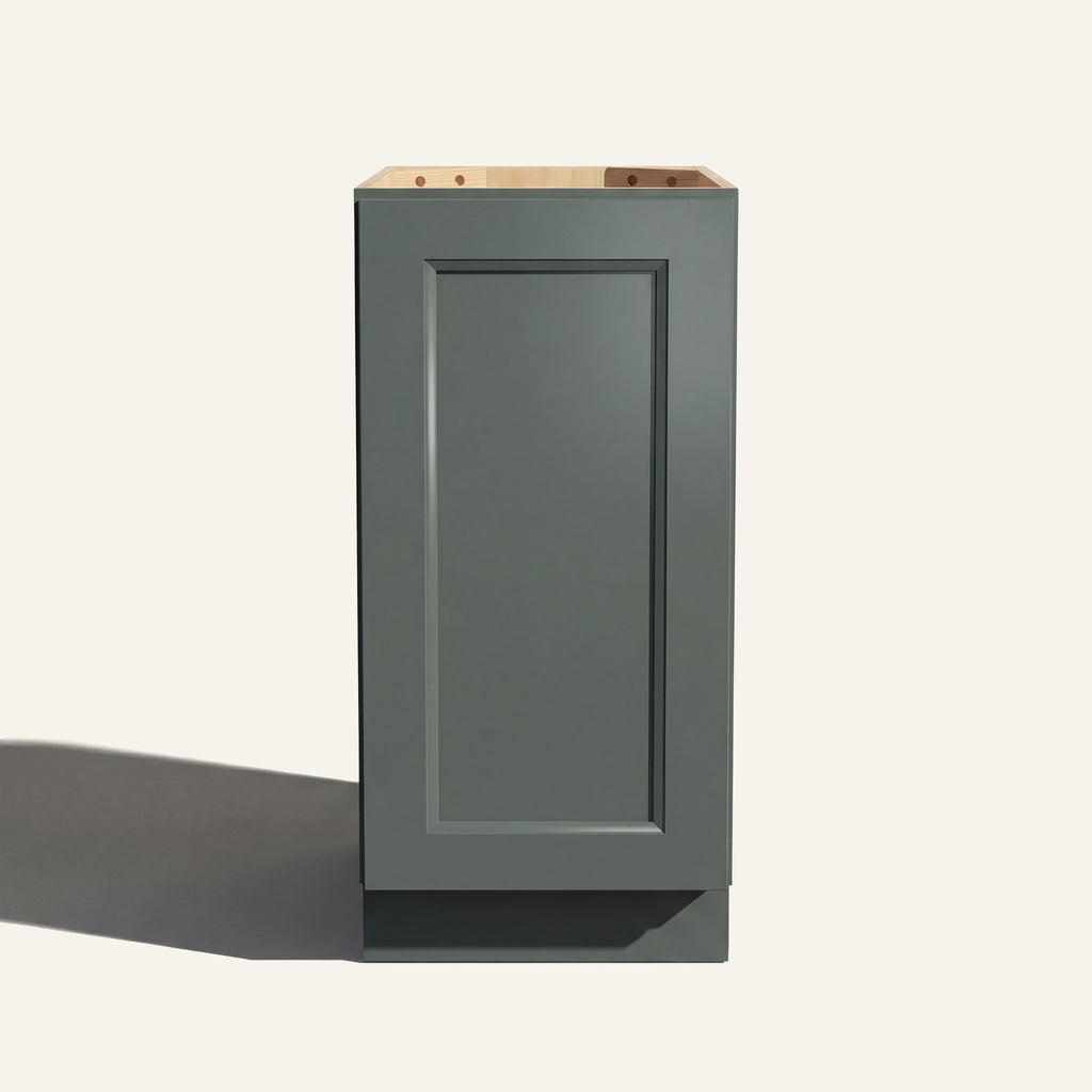 Straight on view of a green Belmont beveled Shaker base cabinet with 1 full-height door.