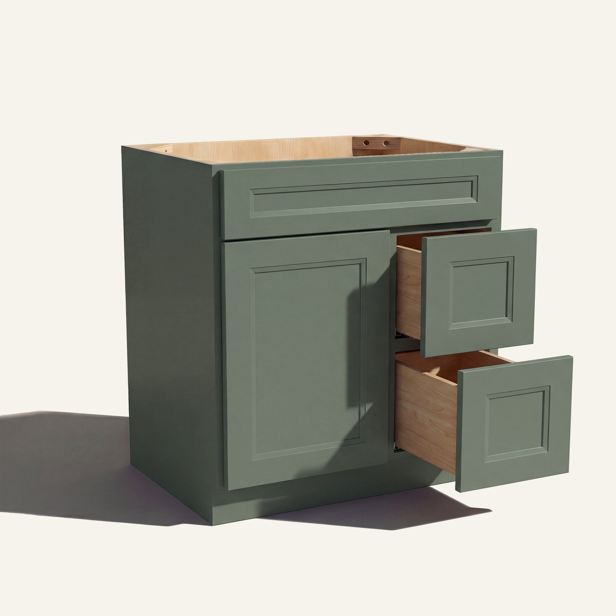 Warm bathroom scene of a green Belmont shaker single sink vanity with 1 door, 2 drawers right, and 1 false front.