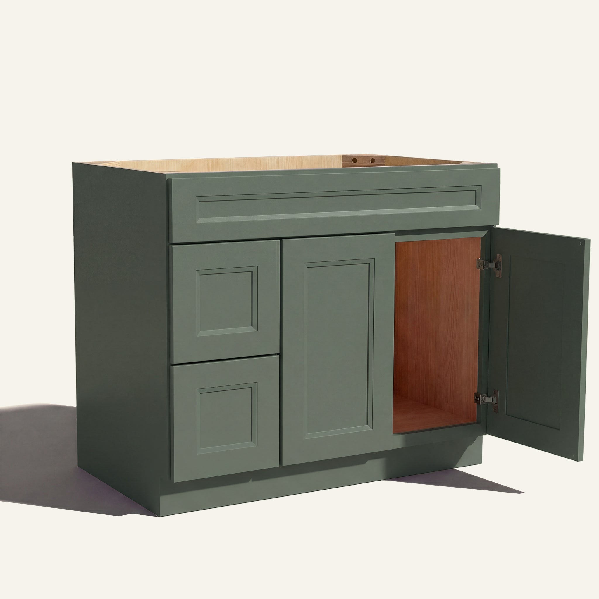 Open right door view of a green Belmont beveled shaker single sink vanity featuring two doors and 2 left-side stacked drawers.