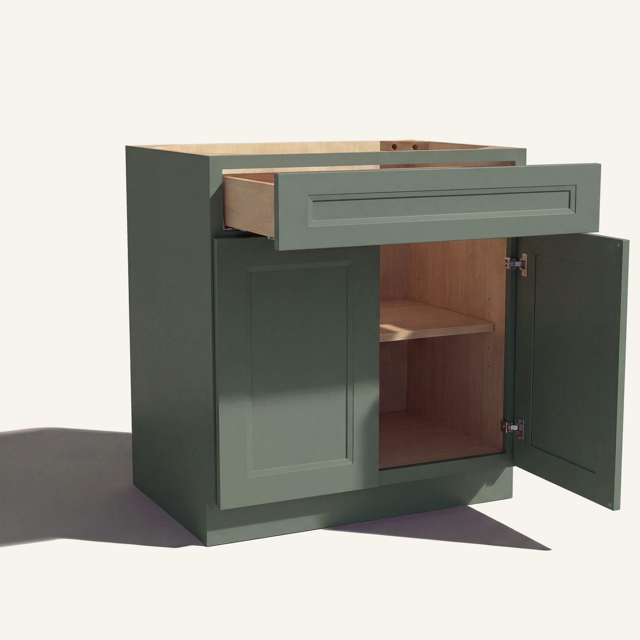 Angle view of a green Belmont beveled shaker base cabinet with 2 doors and 1 open drawer. Right door is open, showing a shelf.