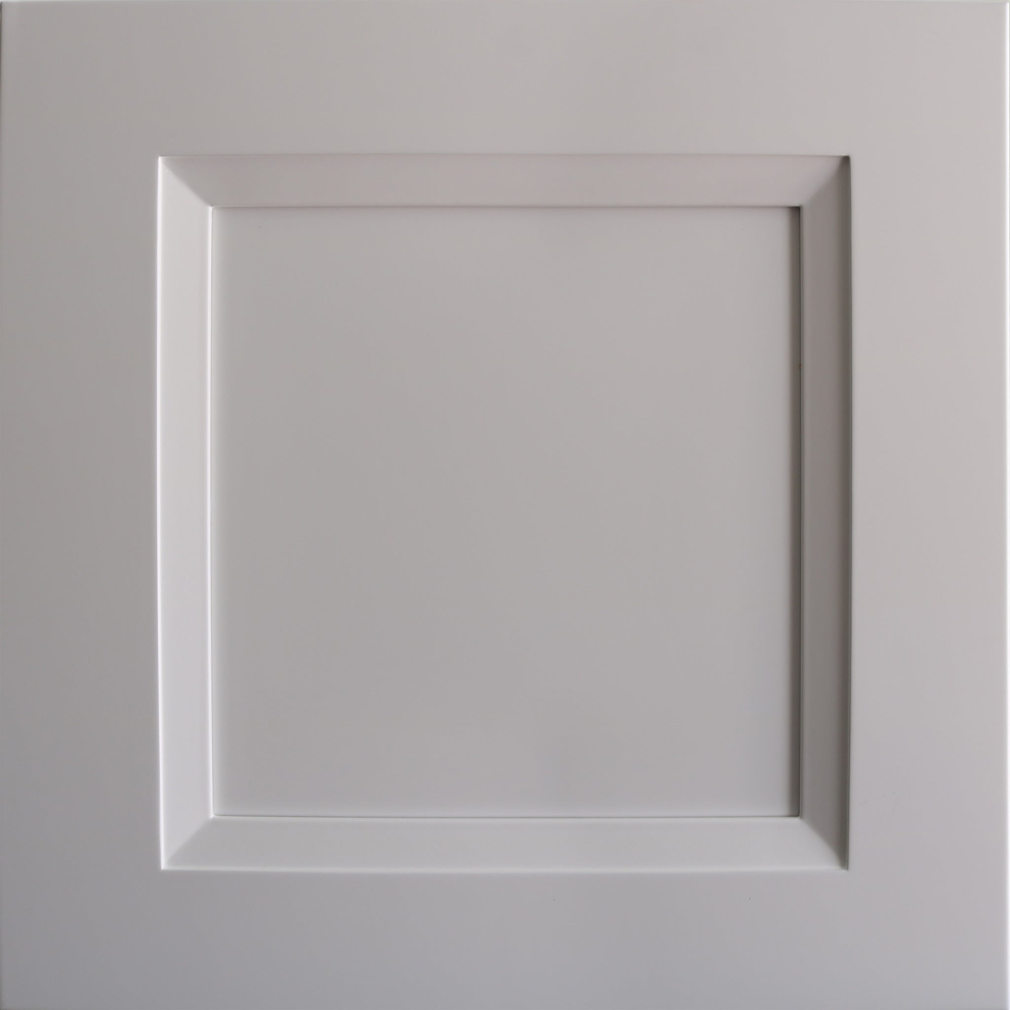 Close up view of a Belmont shaker white cabinet door with a beveled edge that transitions to a recessed panel.