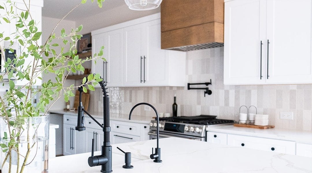 Kitchen with a box style wood range hood