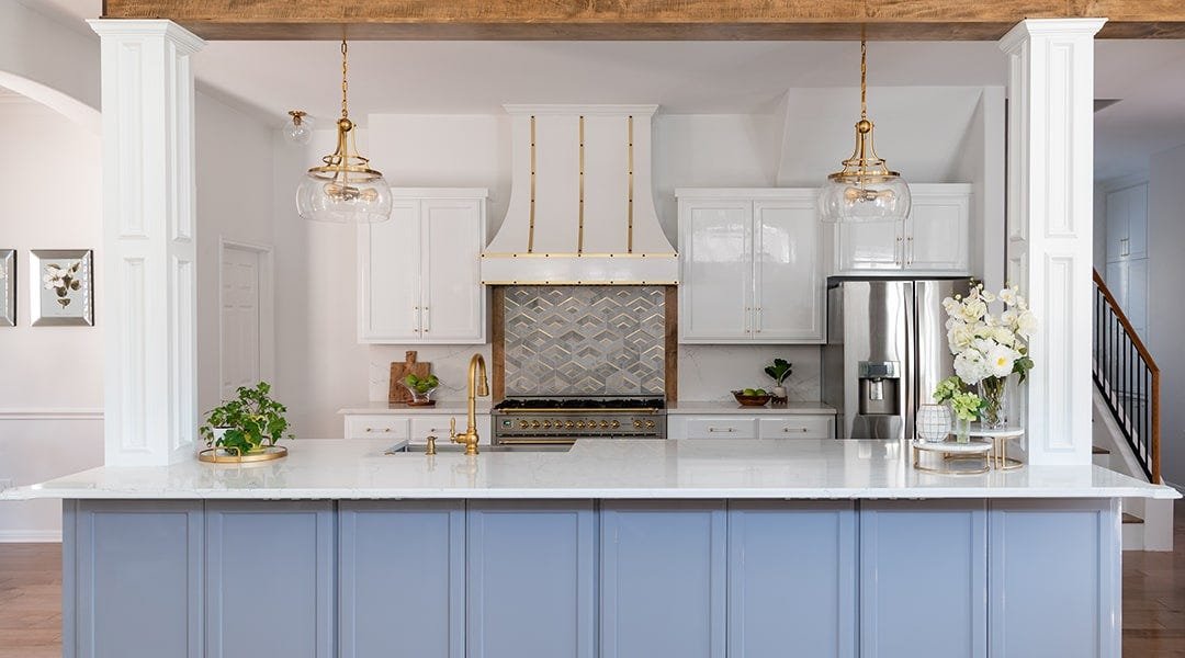 Kitchen with a curved style wood range hood