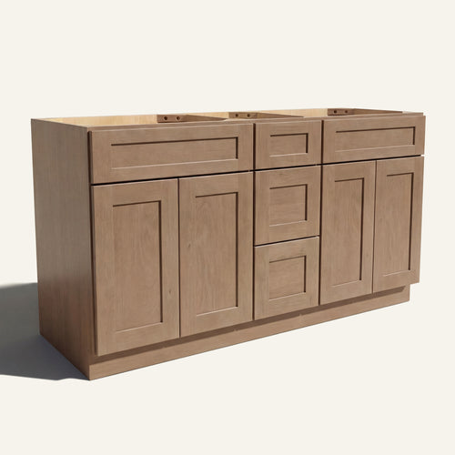 Angled view of a driftwood Seaport Shaker double sink vanity base with 4 doors, 3 drawers, and 2 false drawer fronts.