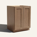 Angled view of a driftwood Seaport Shaker base cabinet with 2 full height doors.