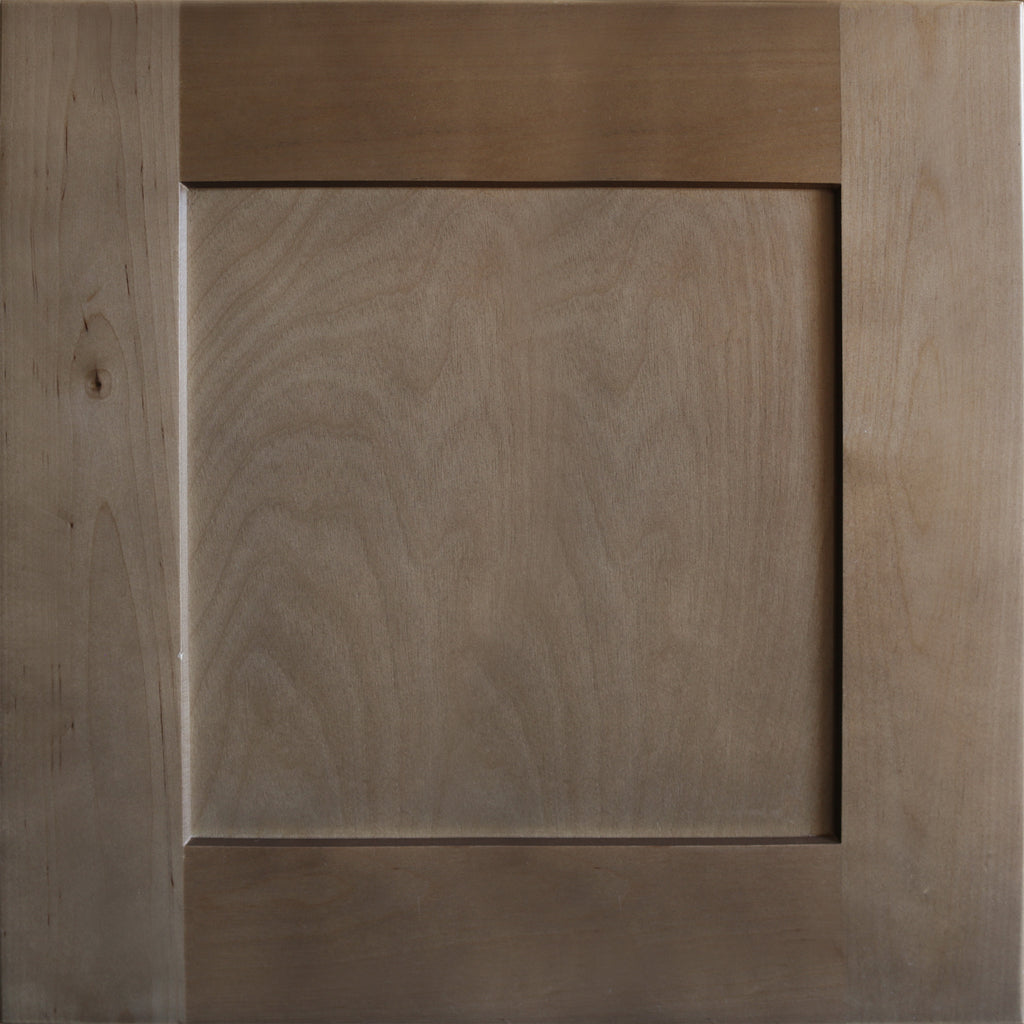 Close up view of a medium brown satin stain on a birch wood Seaport shaker cabinet door with a recessed square panel.