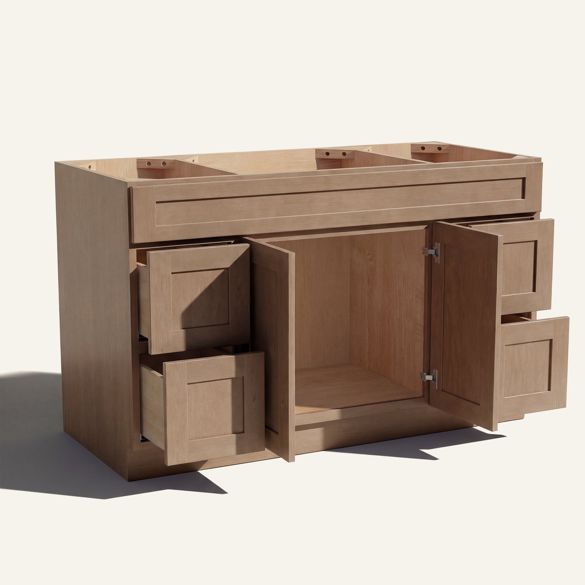 Open view of a driftwood Seaport Shaker single sink vanity base with 2 doors and 4 drawers showing the stained interior.
