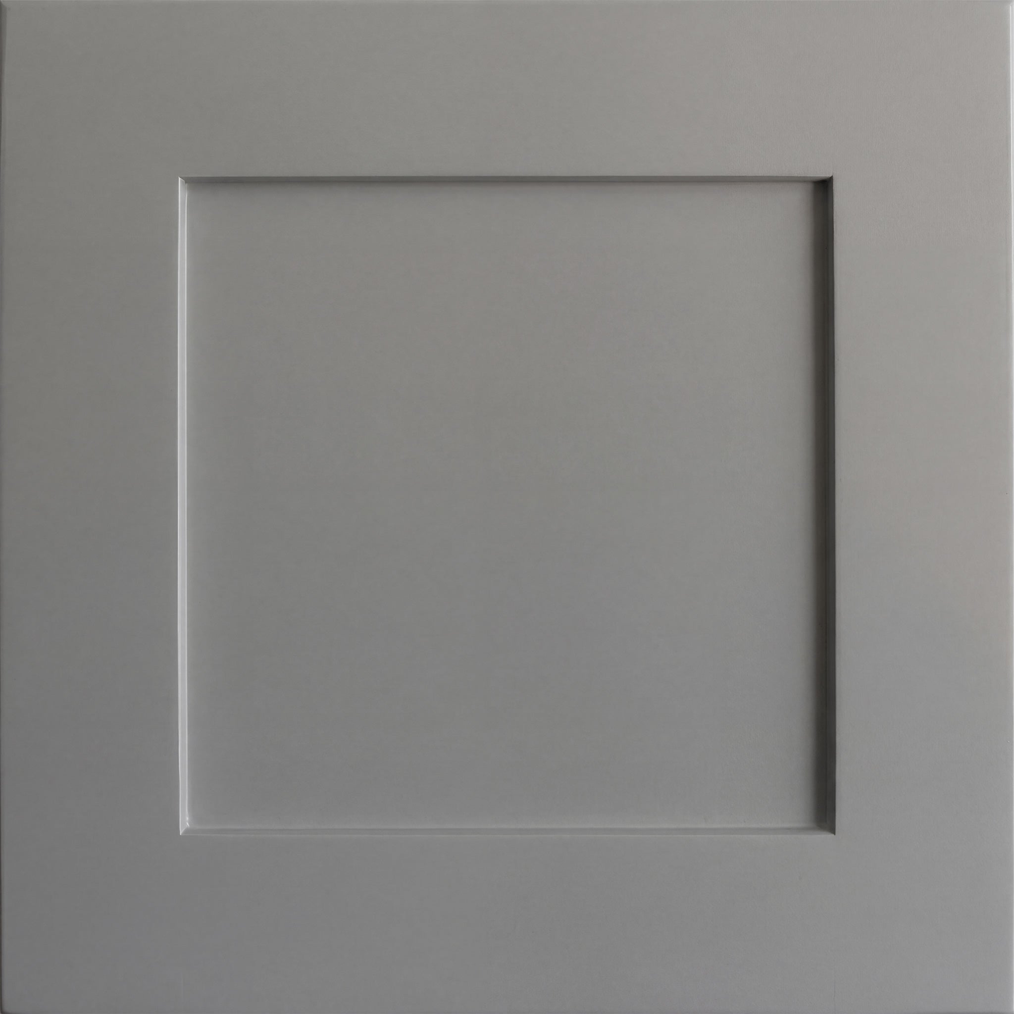 Close up view of a light gray Seaport shaker cabinet door with a recessed square panel.