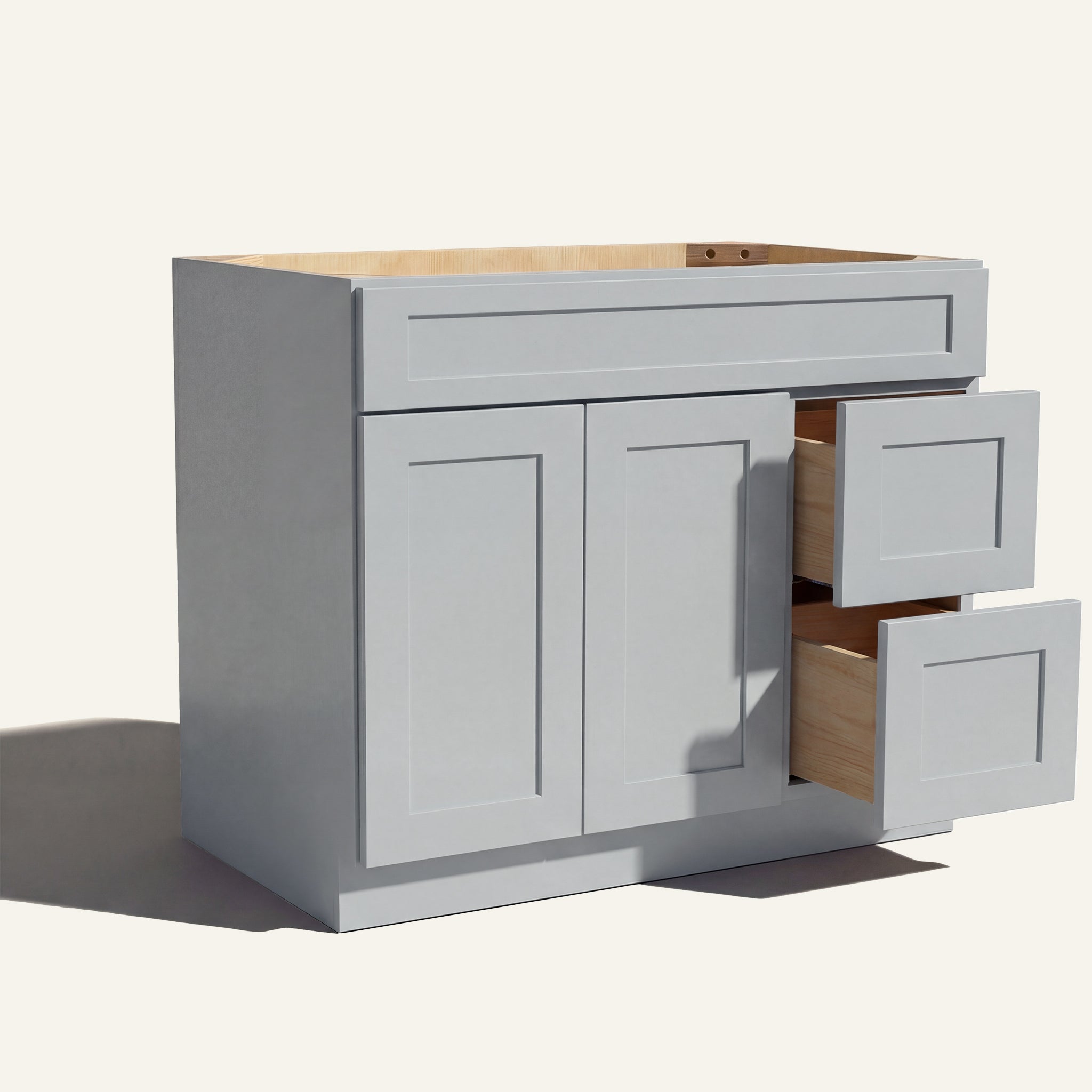 Open view of light gray Seaport Shaker single sink vanity, 2 doors, 2 drawers right, and 1 false drawer front.