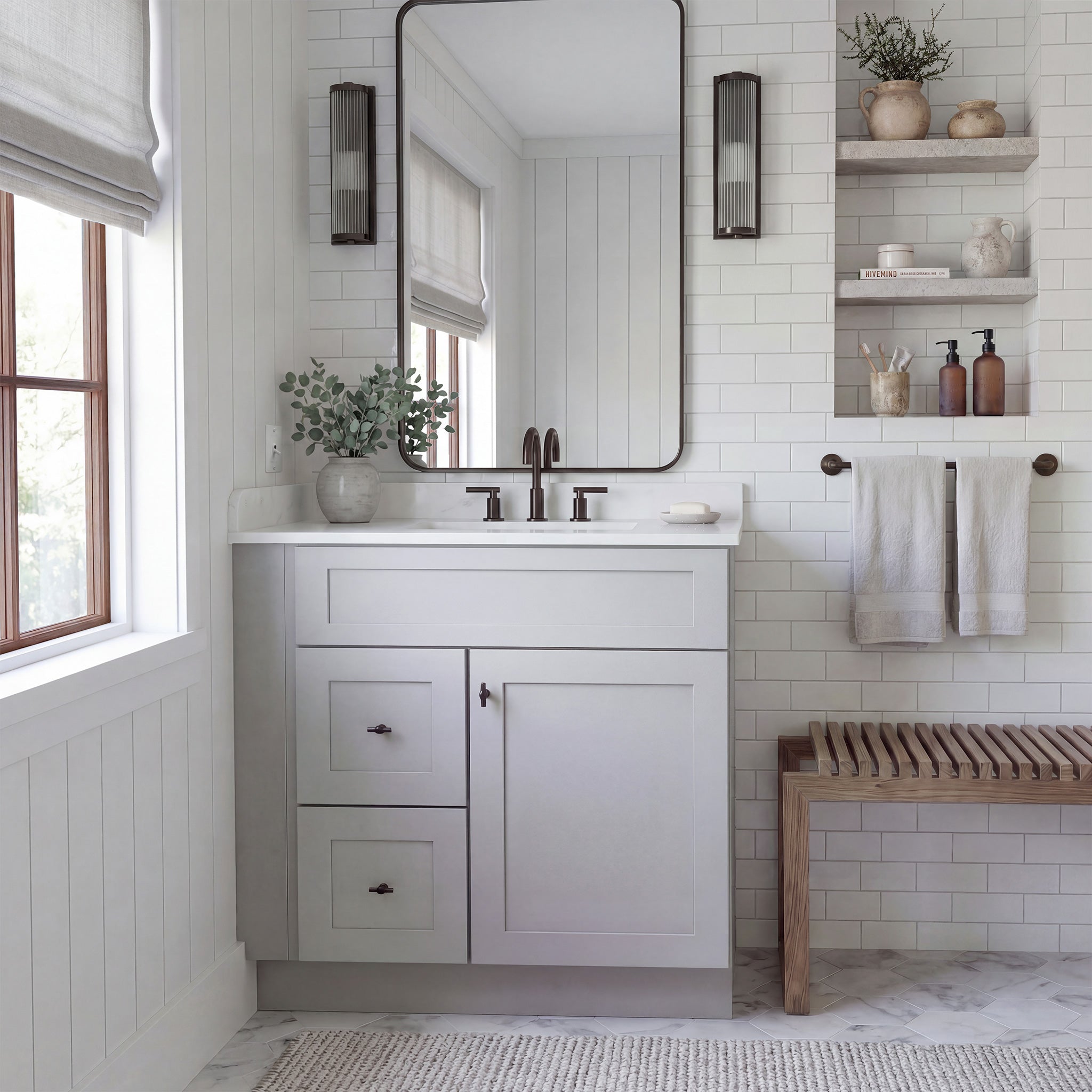 Front view of a light gray Seaport shaker single sink vanity with 1 door, 2 drawers left, and 1 false drawer in a warm bathroom.