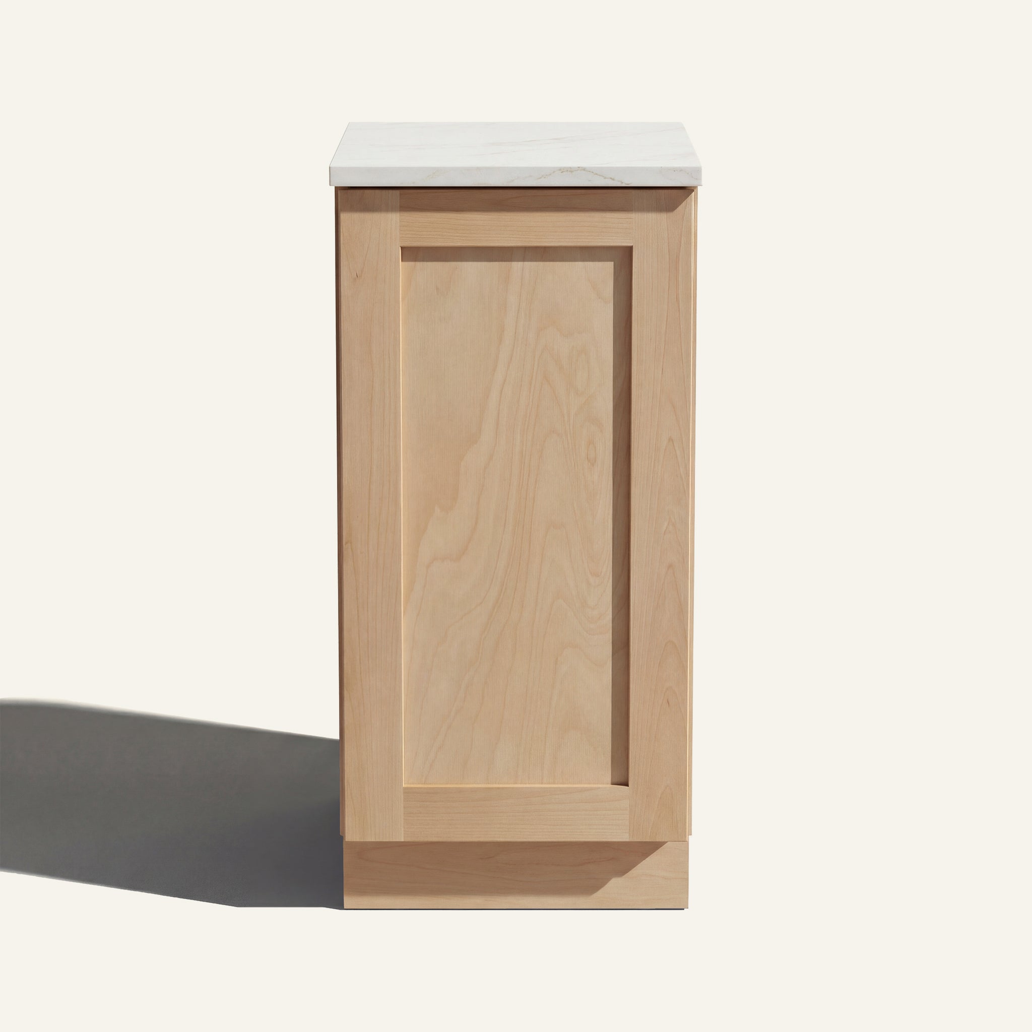 Straight on view of a natural Seaport Shaker base cabinet with 1 full-height door.