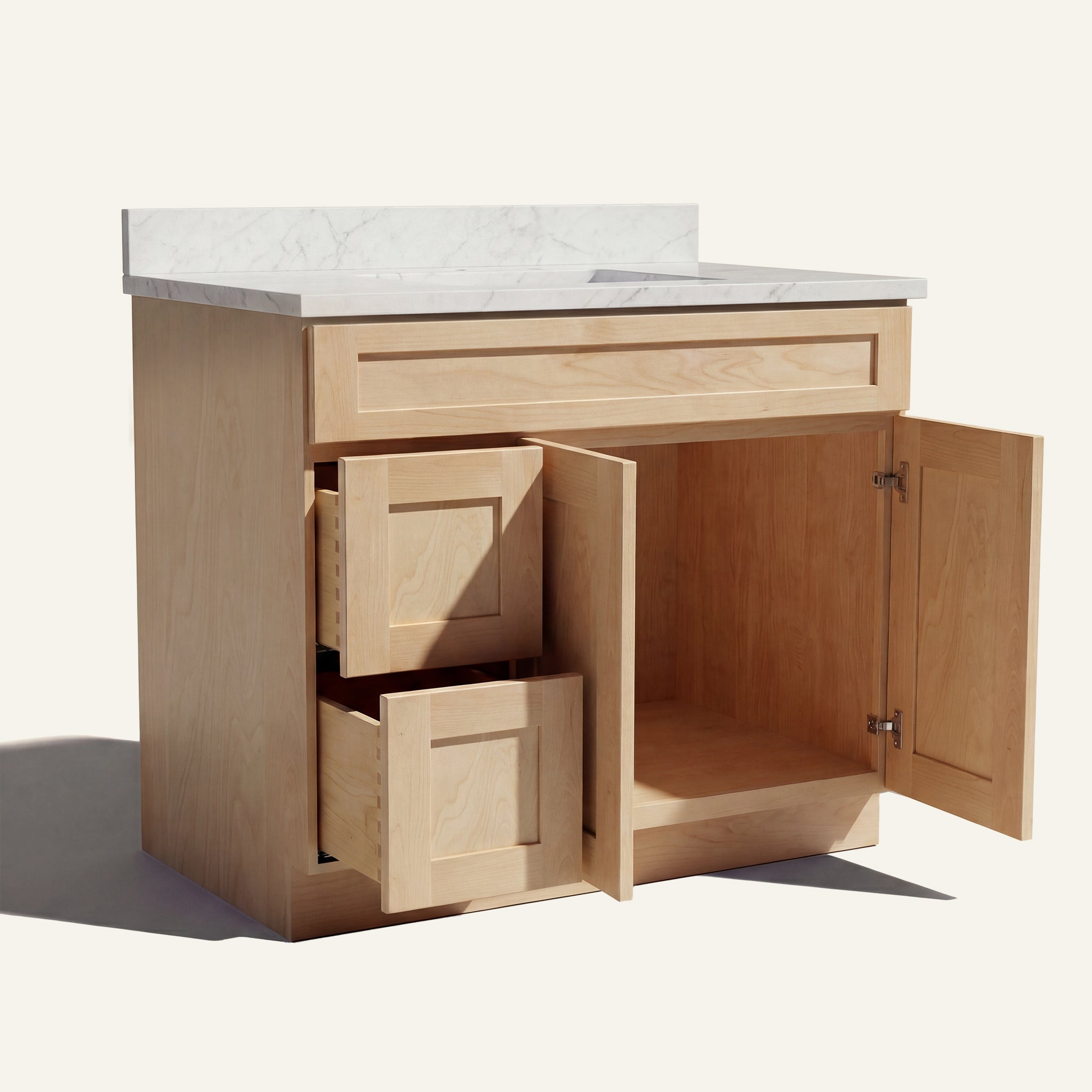 Open right door view of a natural Seaport shaker single sink vanity featuring two doors and 2 left-side stacked drawers.