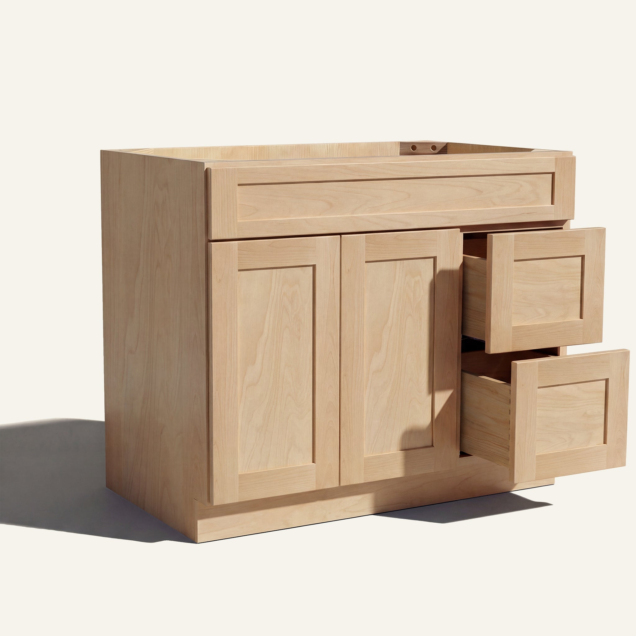 Open view of natural Seaport Shaker single sink vanity, 2 doors, 2 drawers right, and 1 false drawer front.
