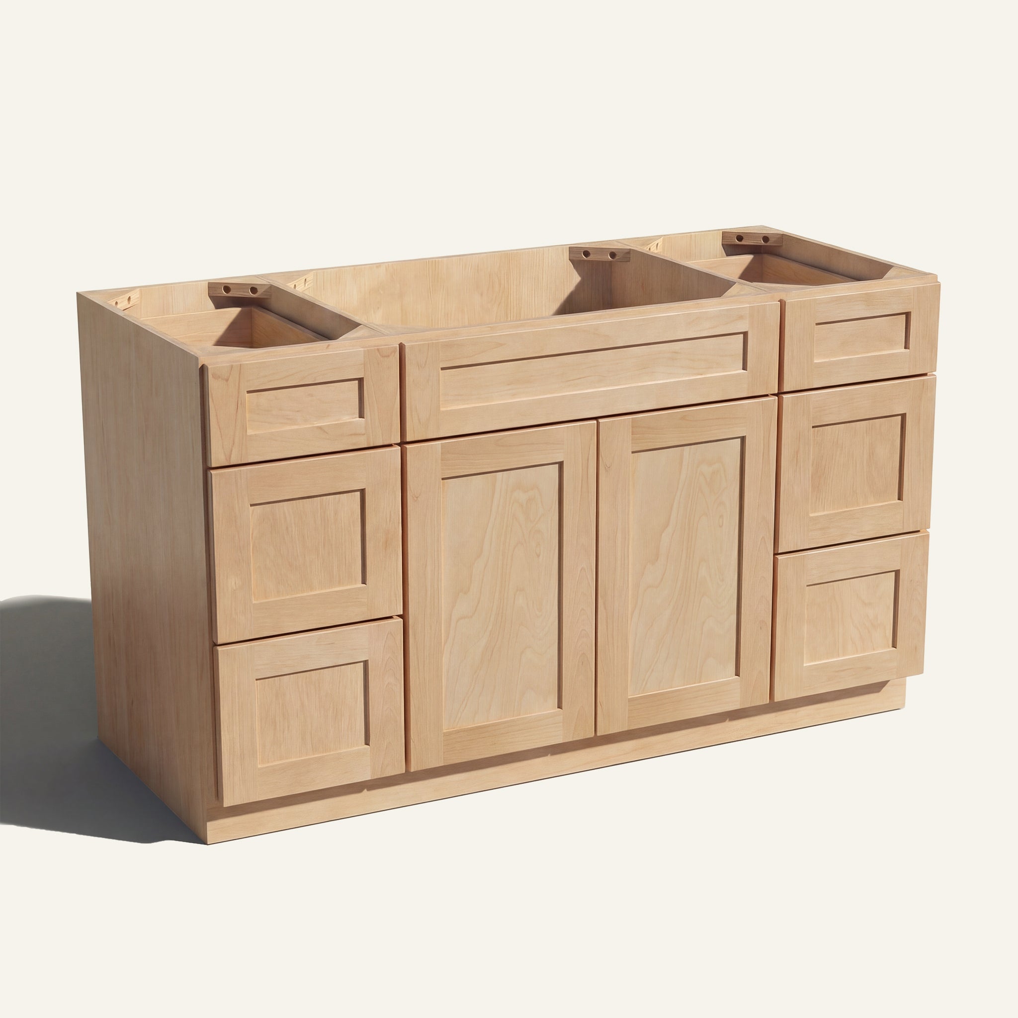 Angled view of a natural Seaport Shaker 60w single sink vanity with 2 doors, 6 drawers and 1 false drawer front.