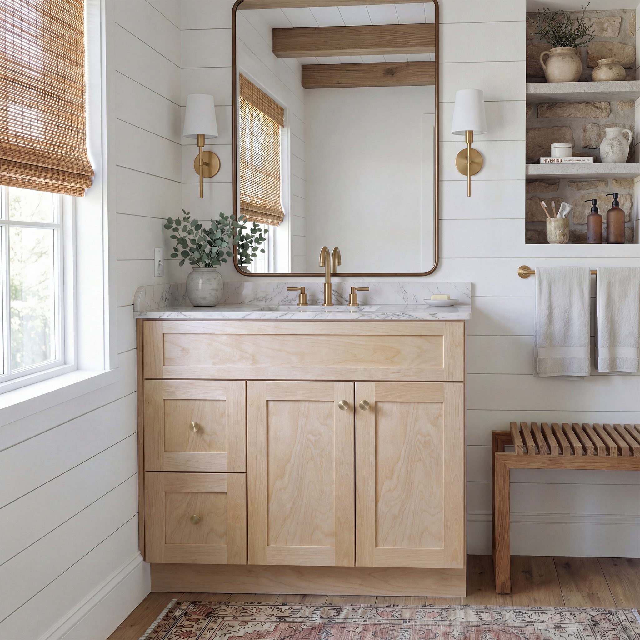 Front view of a natural Seaport shaker vanity with 2 doors, 2 drawers left, and 1 false drawer in a warm traditional bathroom.