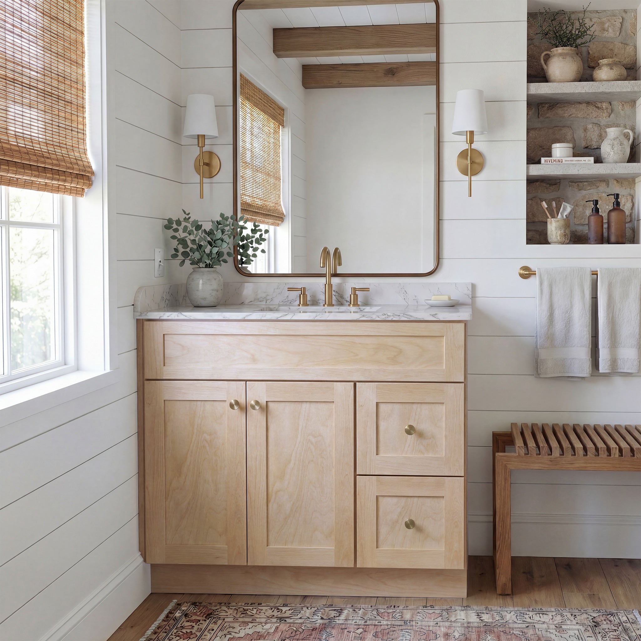 Front view of a natural Seaport shaker vanity with 2 doors, 2 drawers right, and 1 false drawer in a warm traditional bathroom.