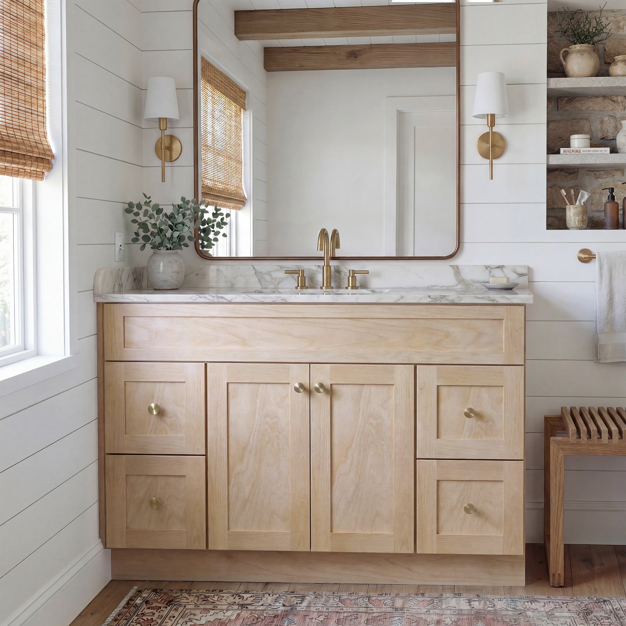 Front view of a natural Seaport shaker vanity with 2 doors, 4 drawers, and 1 false drawer front in a warm traditional bathroom.