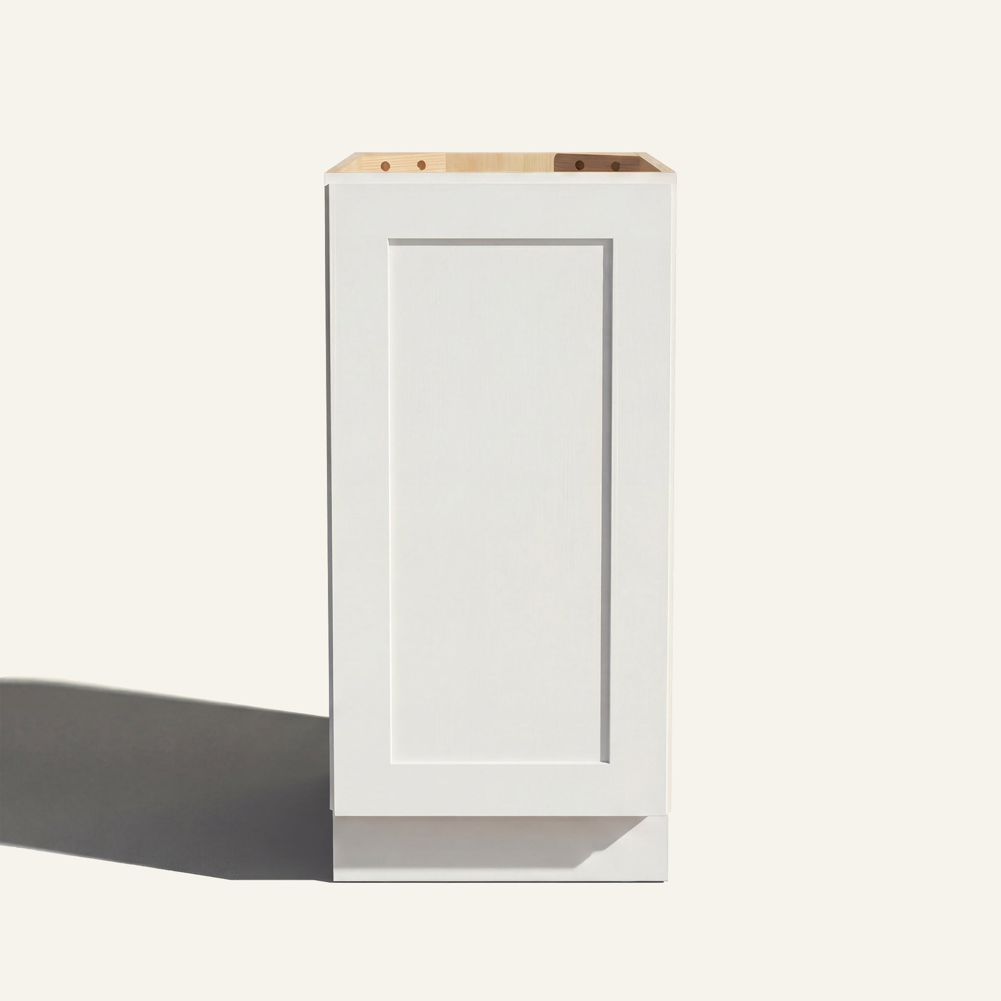 Straight on view of a white Seaport Shaker base cabinet with 1 full-height door.