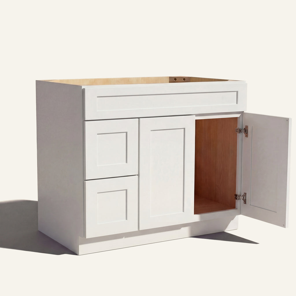 Open right door view of a white Seaport shaker single sink vanity featuring two doors and 2 left-side stacked drawers.