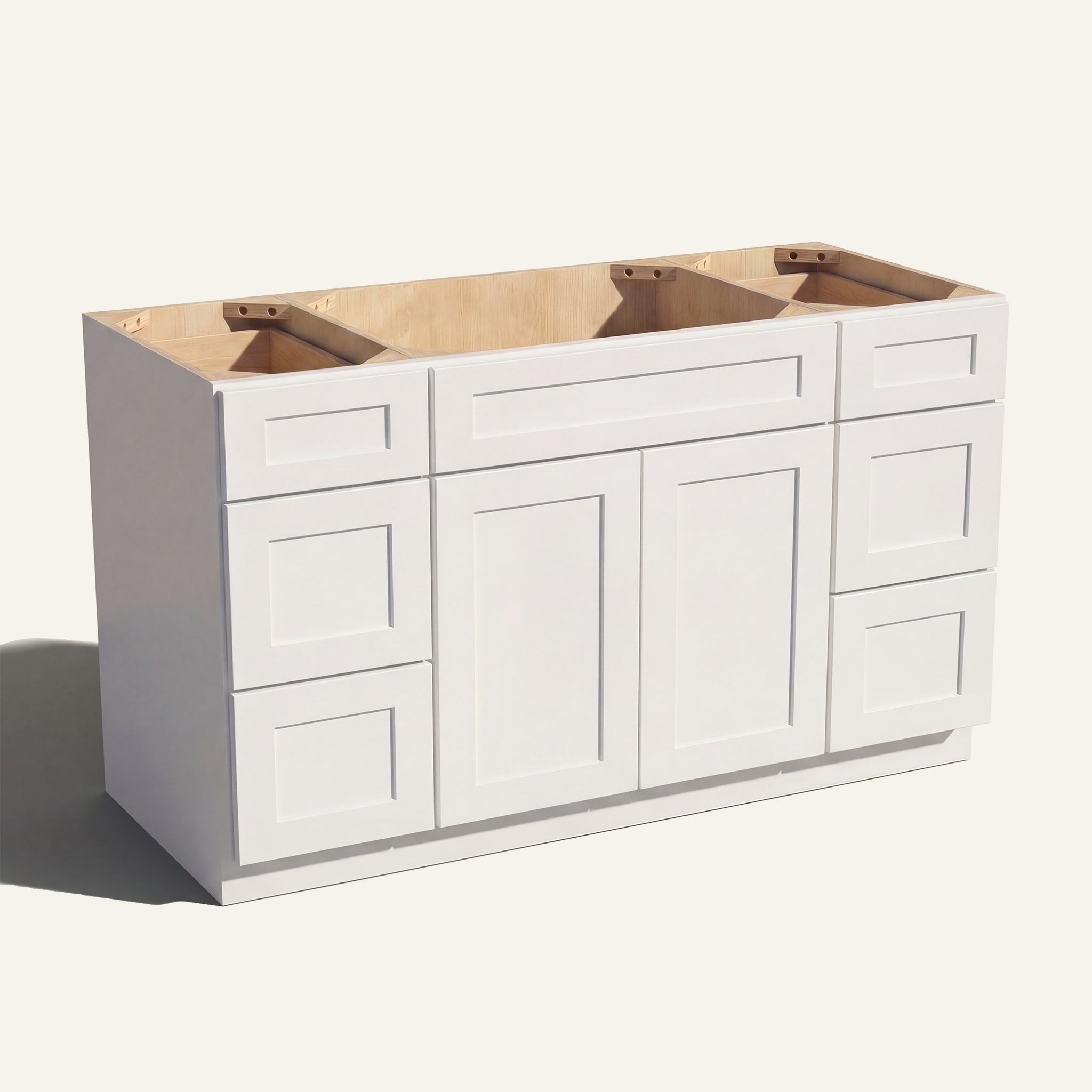 Angled view of a white Seaport Shaker 60w single sink vanity with 2 doors, 6 drawers and 1 false drawer front.