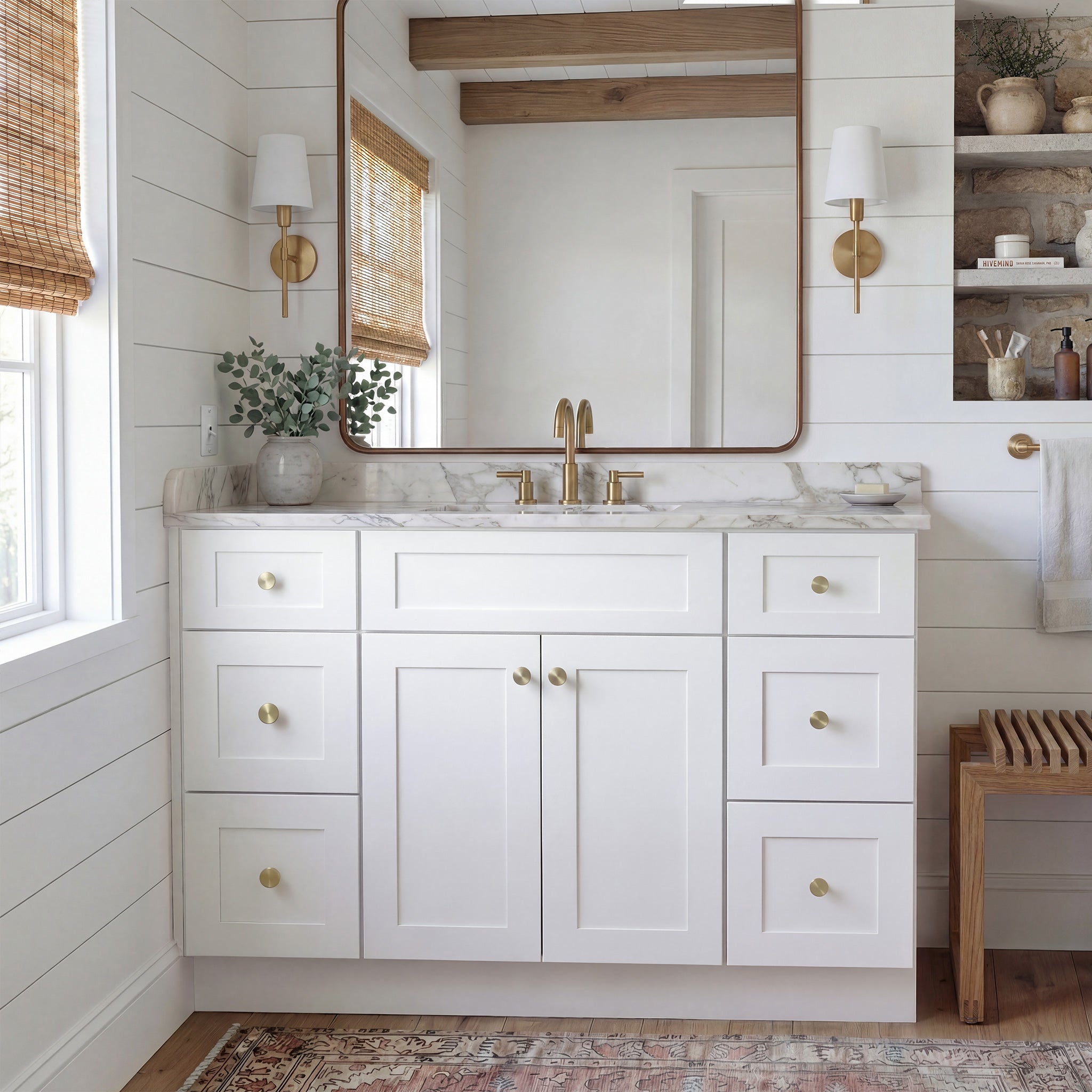 Front view of a white Seaport shaker vanity with 2 doors, 6 drawers, and 1 false drawer front in a warm traditional bathroom.